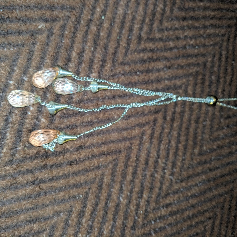 Long necklace.